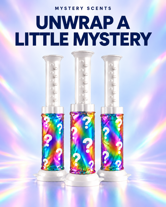 Mystery Scents Clean Discs in rainbow foil wraps against a prismatic background